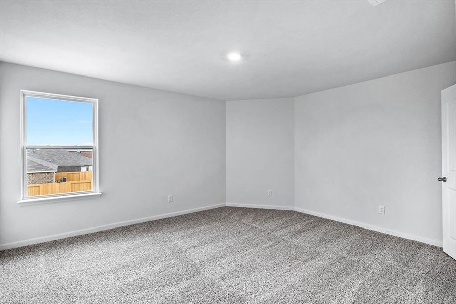 Empty room featuring carpet