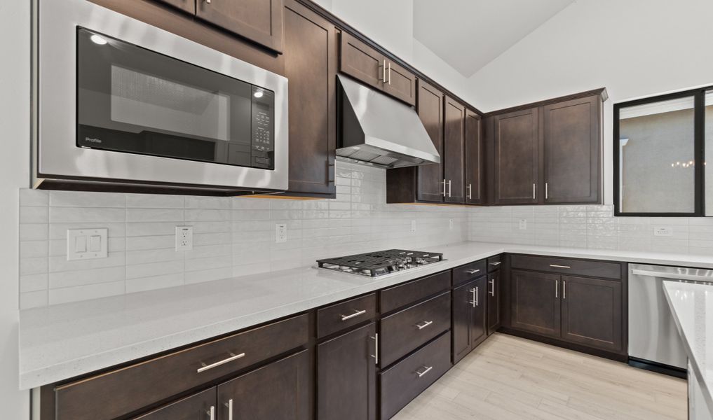 Kitchen with stainless-steel appliances Kitchen with stainless-steel appliances