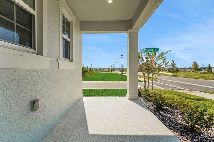Front exterior of a new home in Crossroads at Kelly Park, Apopka, FL, highlighting curb appeal (Image 16).