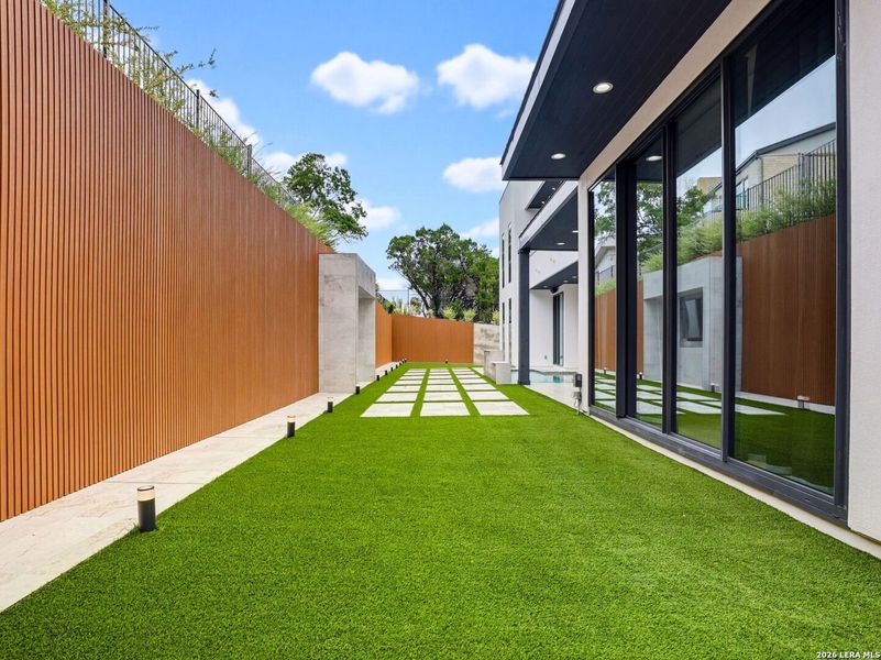 Exterior details and patio area of a home in , San Antonio (Image 38).