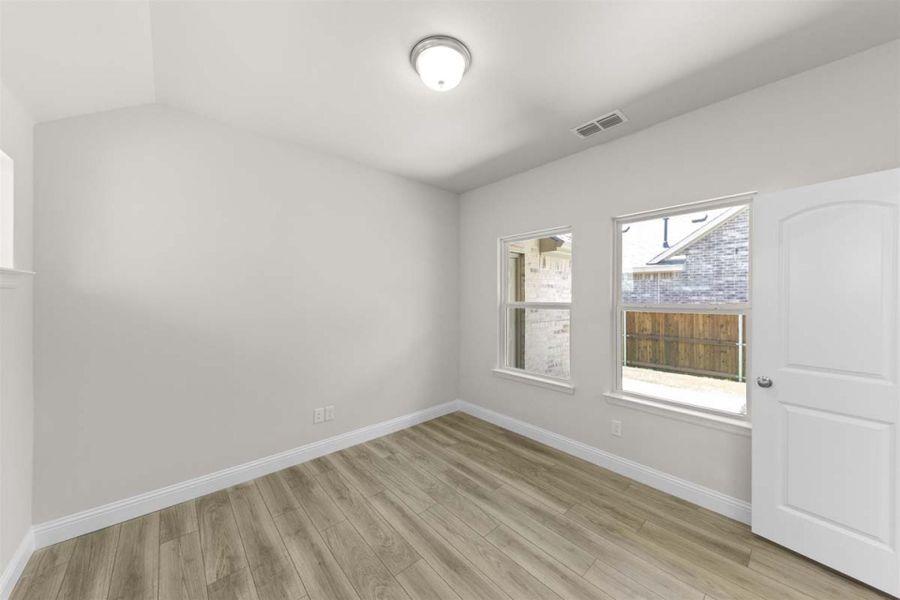 Spacious, unfurnished interior of a new home in The Reserve at Spiritas Ranch, Little Elm (Image 15).