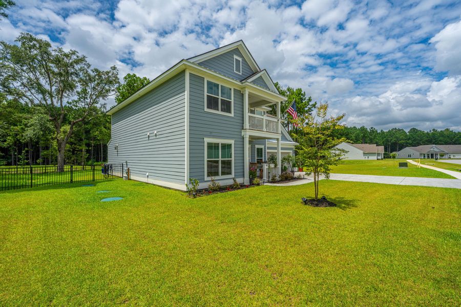 Front exterior of a new home in Sea Island Preserve, Johns Island, SC, highlighting curb appeal (Image 24).