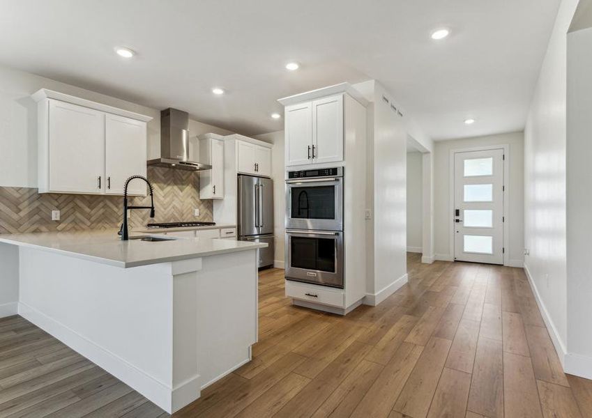 The beautiful kitchen was built to make cooking and cleaning easier!