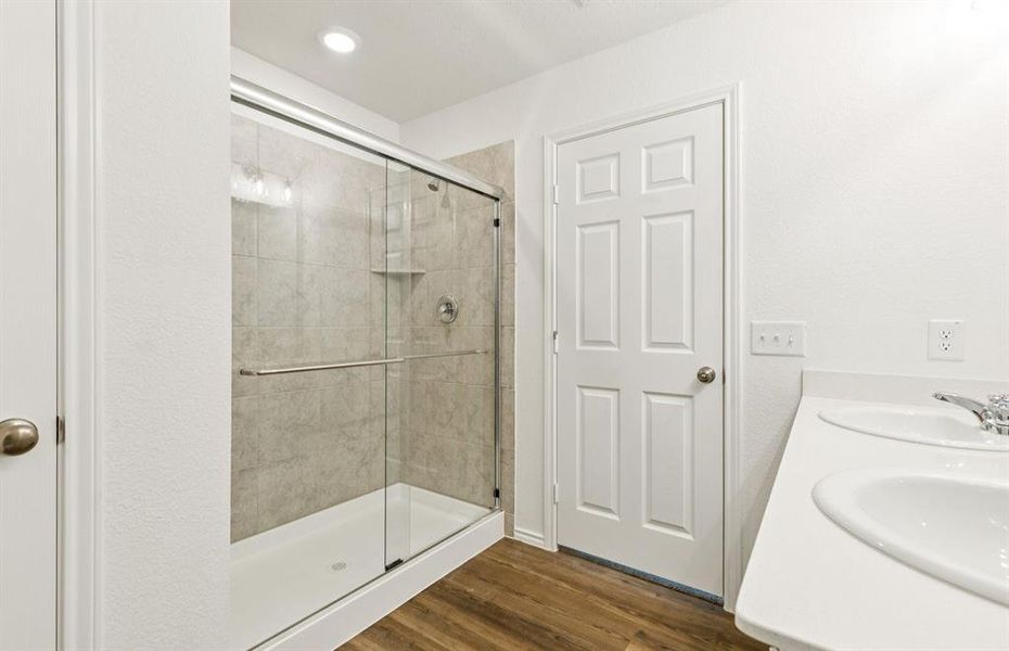 Owner's private bath with full walk-in shower