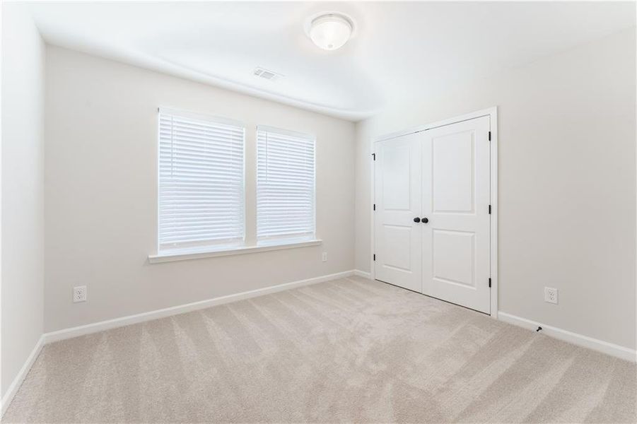 Spacious, unfurnished interior of a new home in Edenglen, Buford (Image 25).
