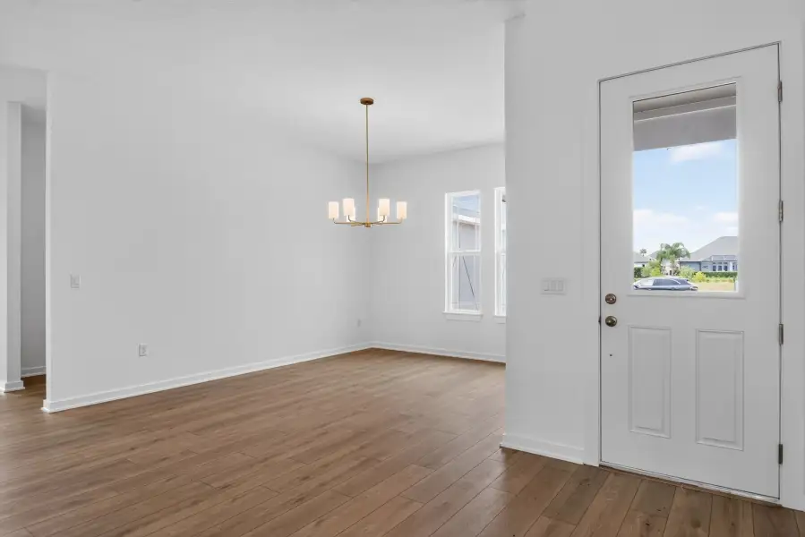 Spacious, unfurnished interior of a new home in Ardisia Park, New Smyrna Beach (Image 16).