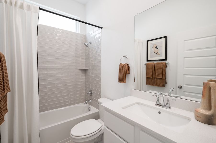 Representative furnished interior of a home built from the Wren by Tri Pointe Homes in Oakhill Reserve, Tomball (Image 32).