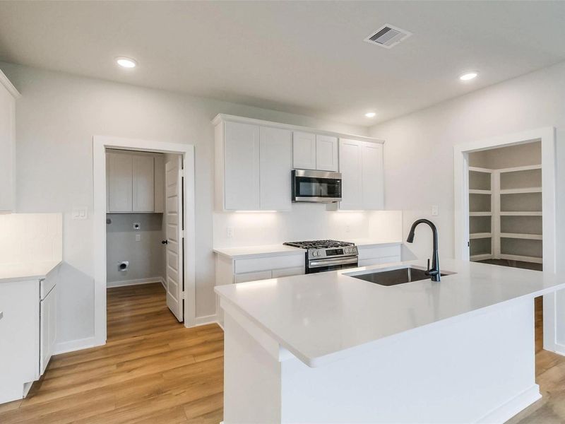 Furnished interior view inside a new home in Emberly, Beasley (Image 9).
