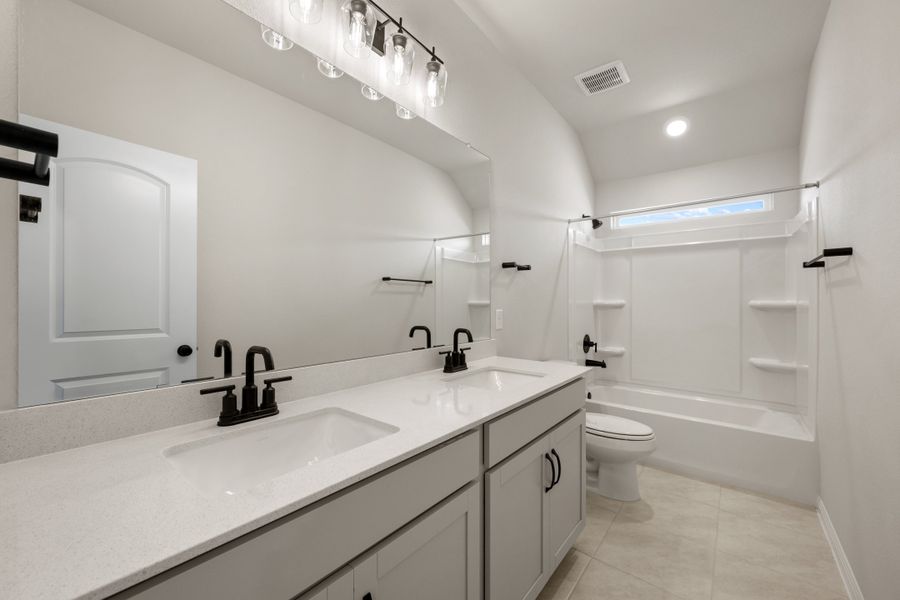 Representative furnished interior of a home built from the Granbury by Ashton Woods in The Trails at Carmel, Pflugerville (Image 38).