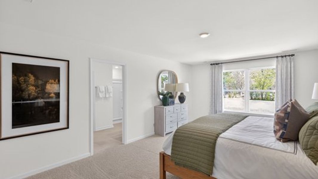 Furnished interior view inside a new home in The Grove at Matthews Landing, Fuquay Varina (Image 13).