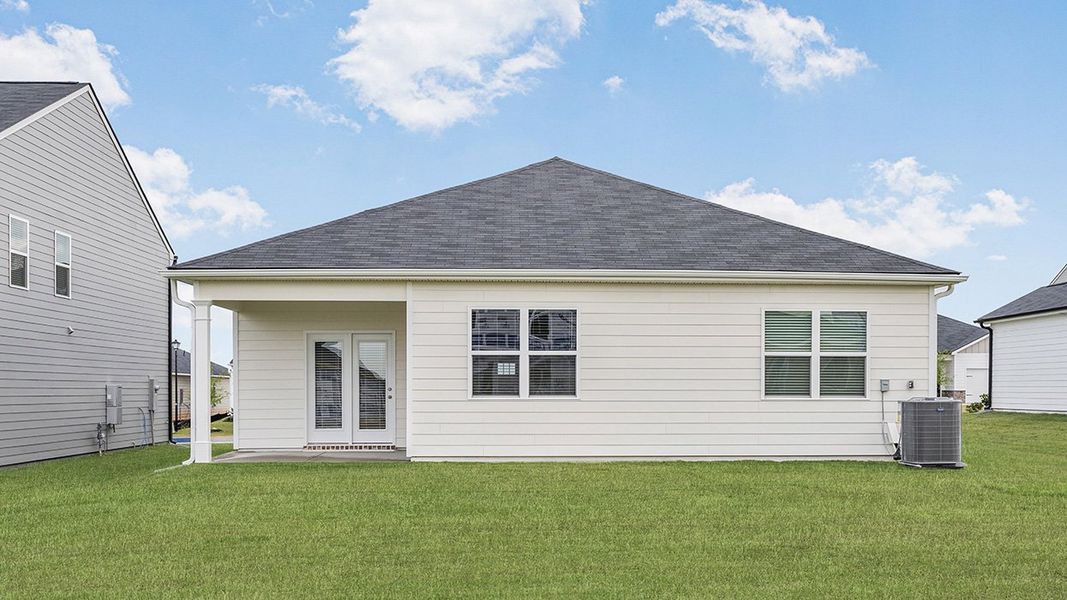Exterior details and patio area of a home in Highland Hills, Graniteville (Image 3).