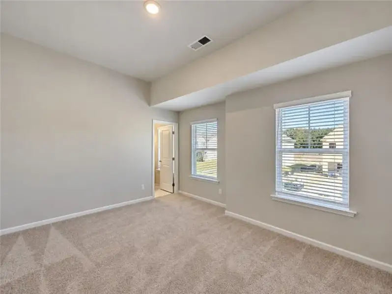 Spacious, unfurnished interior of a new home in Kingsmere Estates, Loganville (Image 28).