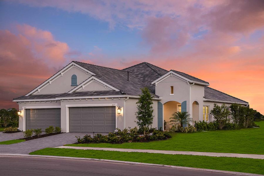 Front exterior of a new home in Windward, Sarasota, FL, highlighting curb appeal (Image 2). Front exterior of a new home in Windward, Sarasota, FL, highlighting curb appeal (Image 2).