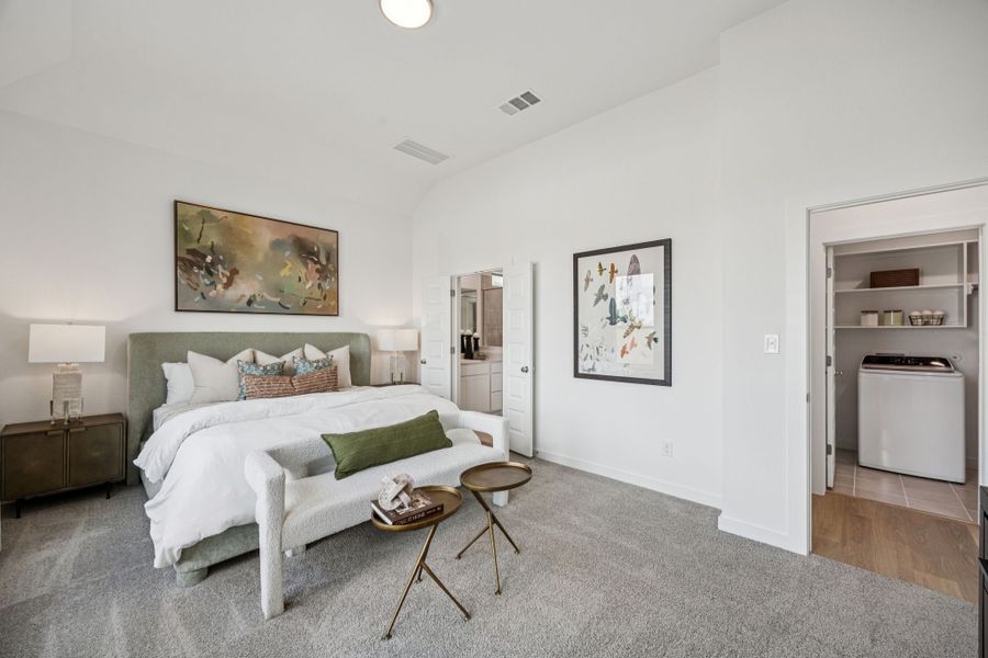 Primary Suite in the Trinity home plan by Trophy Signature Homes – REPRESENTATIVE PHOTO