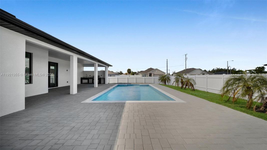 Exterior details and patio area of a home in , Cape Coral (Image 33).