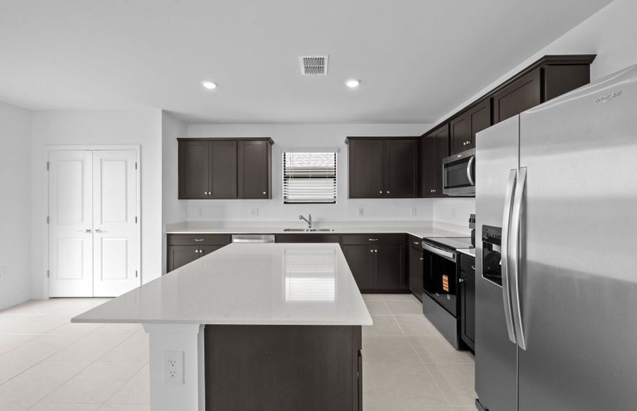 Furnished interior view inside a new home in Whispering Lakes, Lehigh Acres (Image 8).