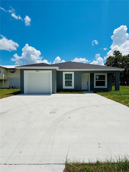 Front exterior of a new home in , Bartow, FL, highlighting curb appeal (Image 1).
