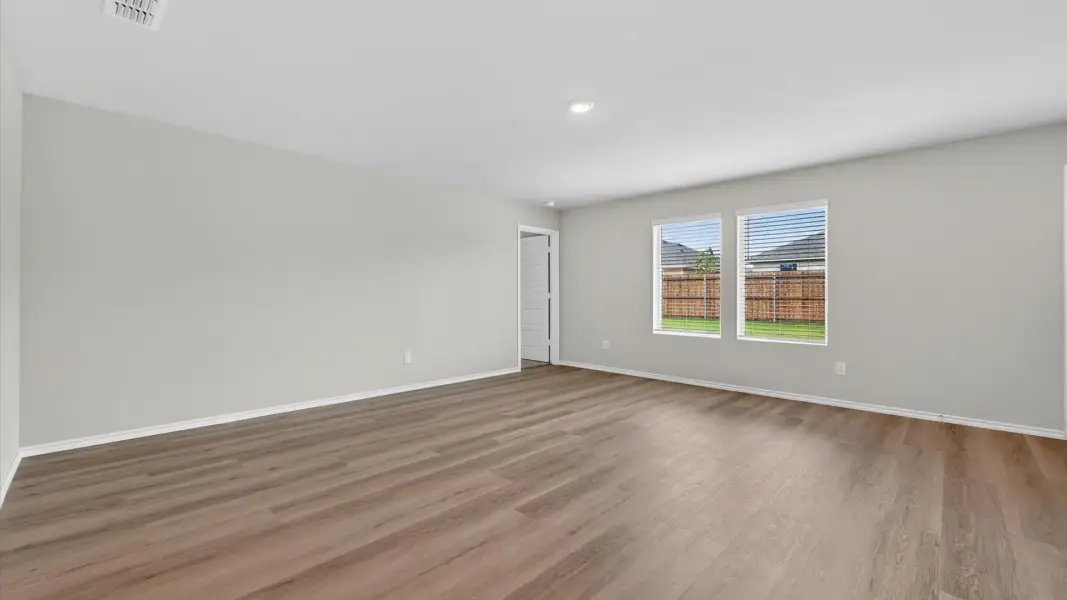 Spacious, unfurnished interior of a new home in Monarch at the Meadows, Ponder (Image 13).
