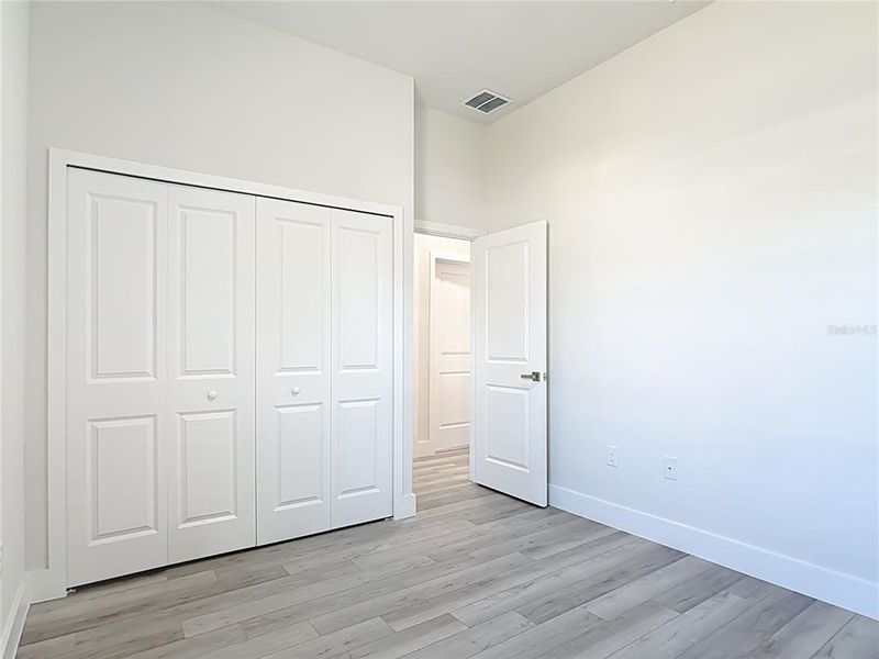 Spacious, unfurnished interior of a new home in , Port Charlotte (Image 43).