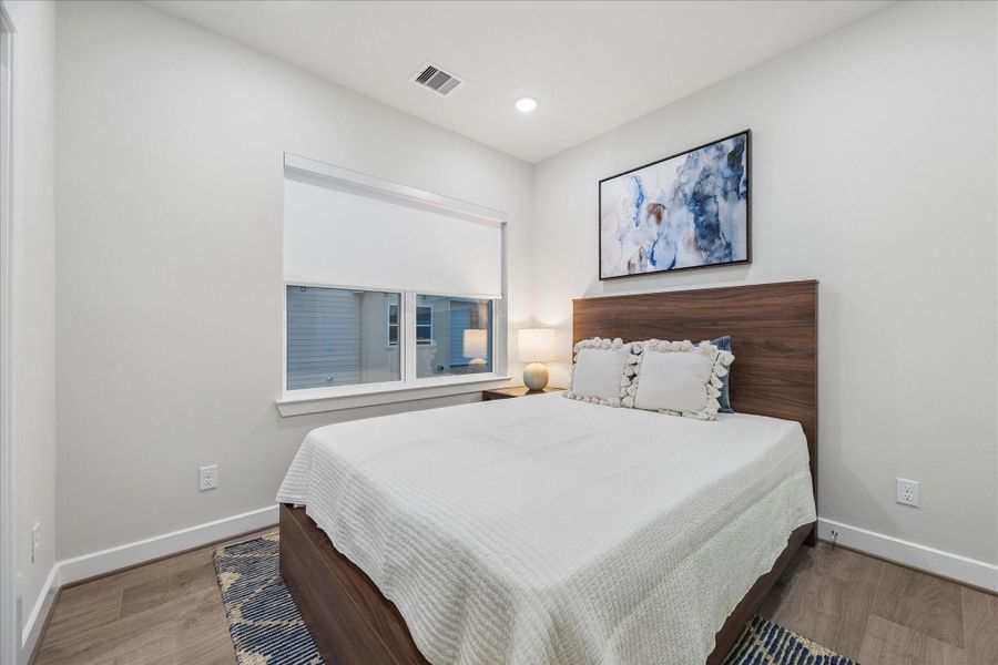 secondary bedroom with private bath. window treatments. LED lighting. secondary bedroom with private bath. window treatments. LED lighting.