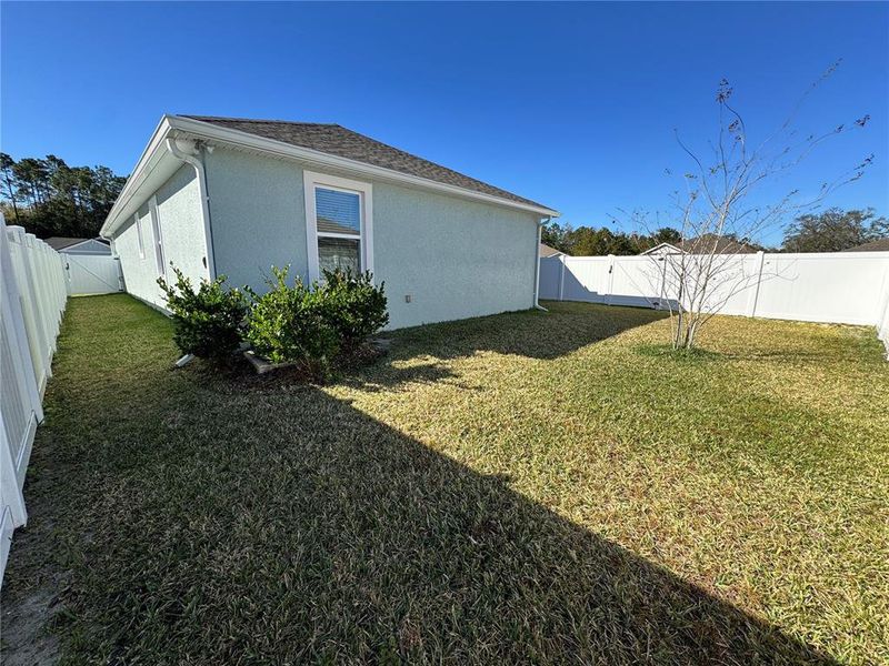Exterior details and patio area of a home in Sawmill Creek at Palm Coast Park, Palm Coast (Image 4). Exterior details and patio area of a home in Sawmill Creek at Palm Coast Park, Palm Coast (Image 4).