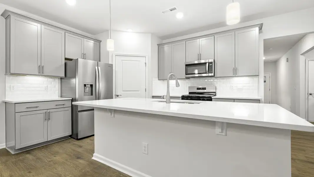 Furnished interior view inside a new home in The Villas at Kinsley, Jamestown (Image 4).