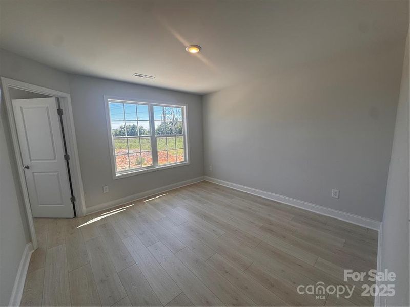 Spacious, unfurnished interior of a new home in Pine Trace, Gastonia (Image 22). Spacious, unfurnished interior of a new home in Pine Trace, Gastonia (Image 22).