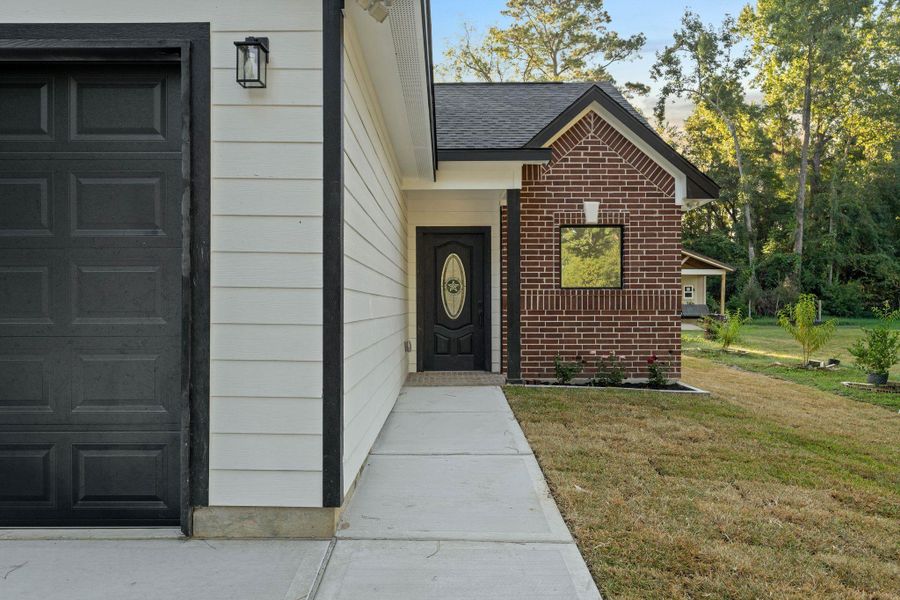 Exterior details and patio area of a home in , Willis (Image 2). Exterior details and patio area of a home in , Willis (Image 2).