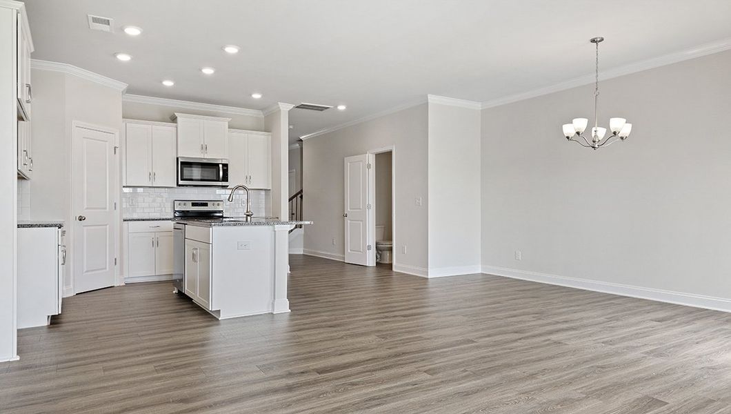 Furnished interior view inside a new home in Townes at Tap Root Farms, Fletcher (Image 8). Furnished interior view inside a new home in Townes at Tap Root Farms, Fletcher (Image 8).