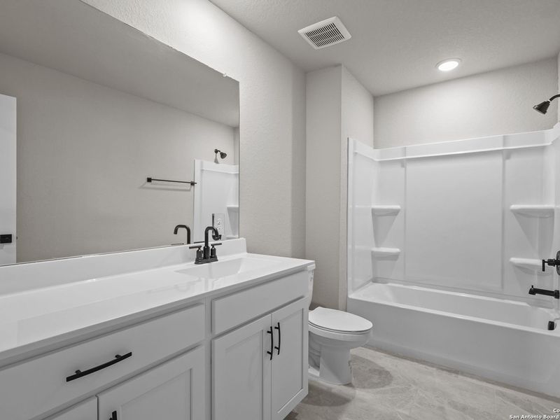 Furnished interior view inside a new home in Royal Crest, San Antonio (Image 10).