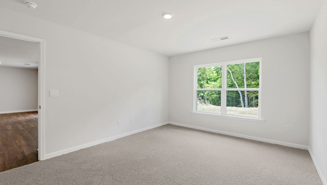 Spacious, unfurnished interior of a new home in Treemont Commons, Wellford (Image 22).