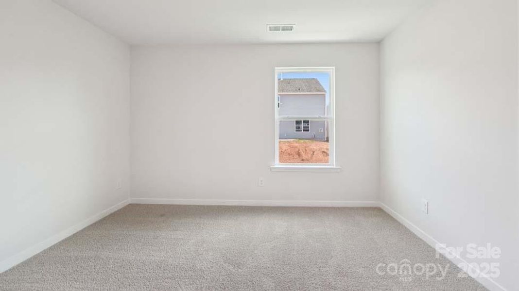 Spacious, unfurnished interior of a new home in Cardinal Creek, Charlotte (Image 16).