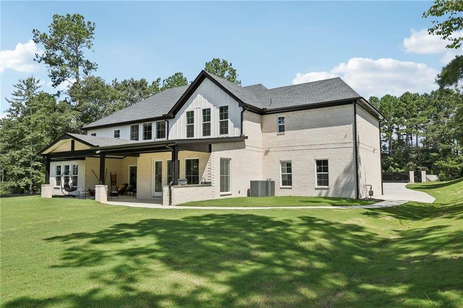 Front exterior of a new home in , Hoschton, GA, highlighting curb appeal (Image 29). Front exterior of a new home in , Hoschton, GA, highlighting curb appeal (Image 29).