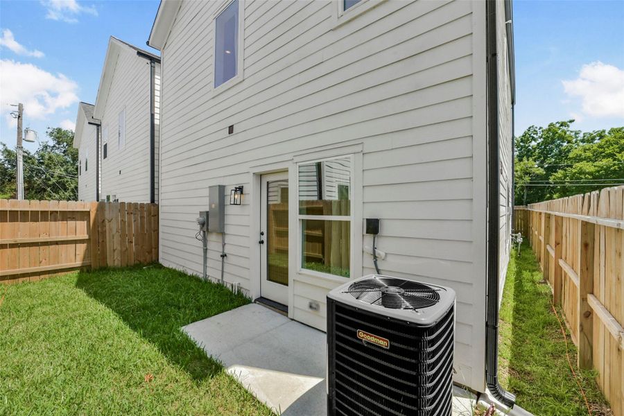 Exterior details and patio area of a home in , Houston (Image 4).