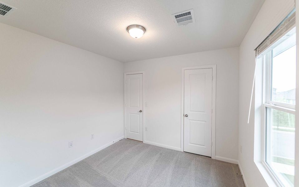 Spacious, unfurnished interior of a new home in Brooklands, Hutto (Image 17).