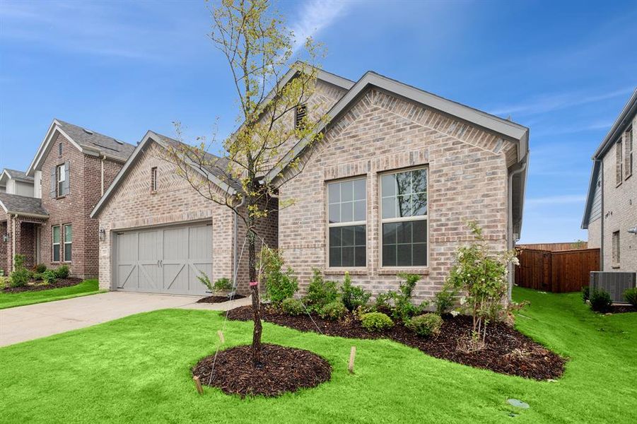 Front exterior of a new home in Lilybrooke at Legacy Hills, Celina, TX, highlighting curb appeal (Image 20). Front exterior of a new home in Lilybrooke at Legacy Hills, Celina, TX, highlighting curb appeal (Image 20).