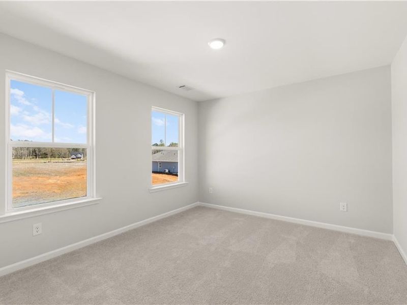 Spacious, unfurnished interior of a new home in Cedar Farms, Winder (Image 24).