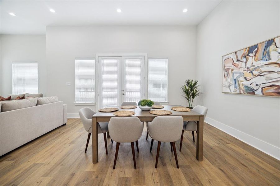 Plenty of natural light comes in through the French doors that lead out to the balcony.