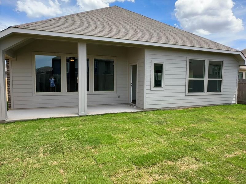 Front exterior of a new home in Crosswinds, Kyle, TX, highlighting curb appeal (Image 16). Front exterior of a new home in Crosswinds, Kyle, TX, highlighting curb appeal (Image 16).