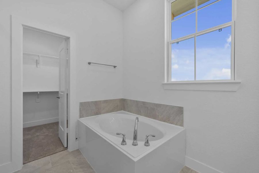 Image 42 representing the Cheverny by Chesmar Homes in Bridgeland Chateau, Cypress, TX.