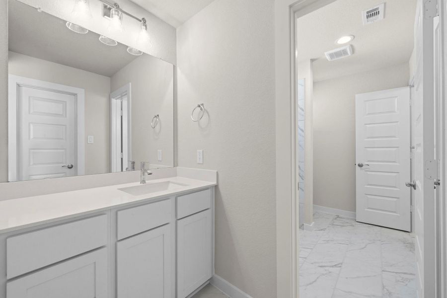 Furnished interior view inside a new home in Barton Creek Ranch, Conroe (Image 11).