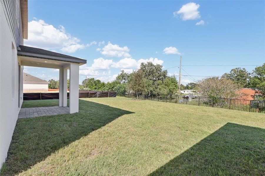 Exterior details and patio area of a home in Crosswinds - Signature Series, Haines City (Image 24).