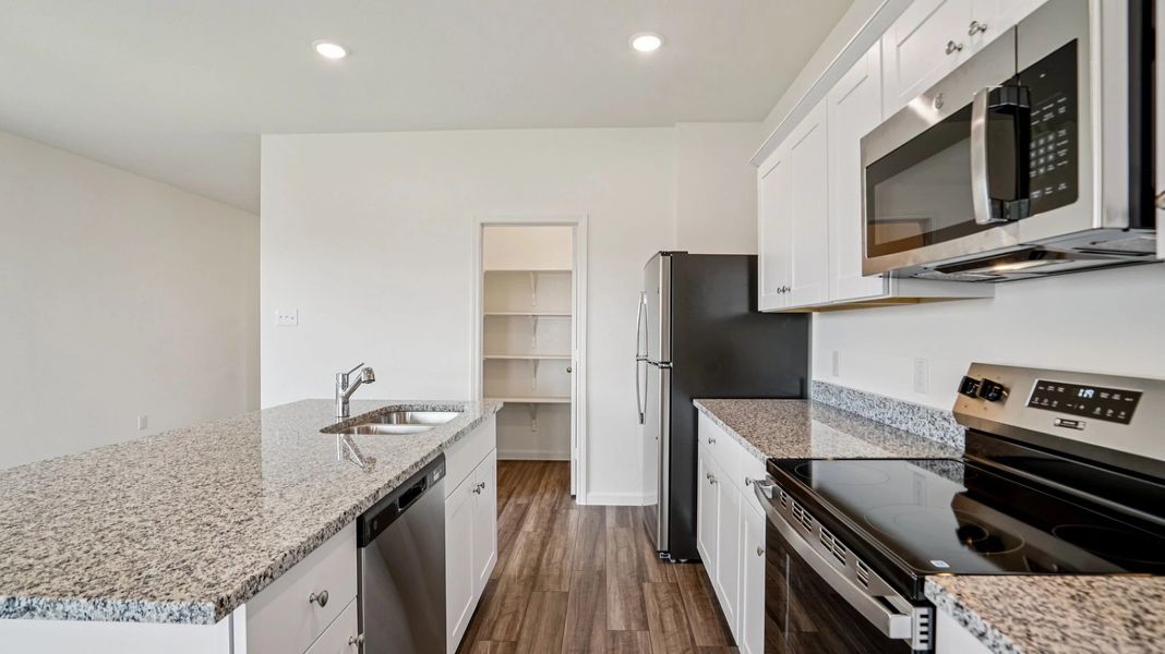 Representative furnished interior of a home built from the Athena by Starlight Homes in Creekview Fossil Ridge, Pilot Point (Image 11).