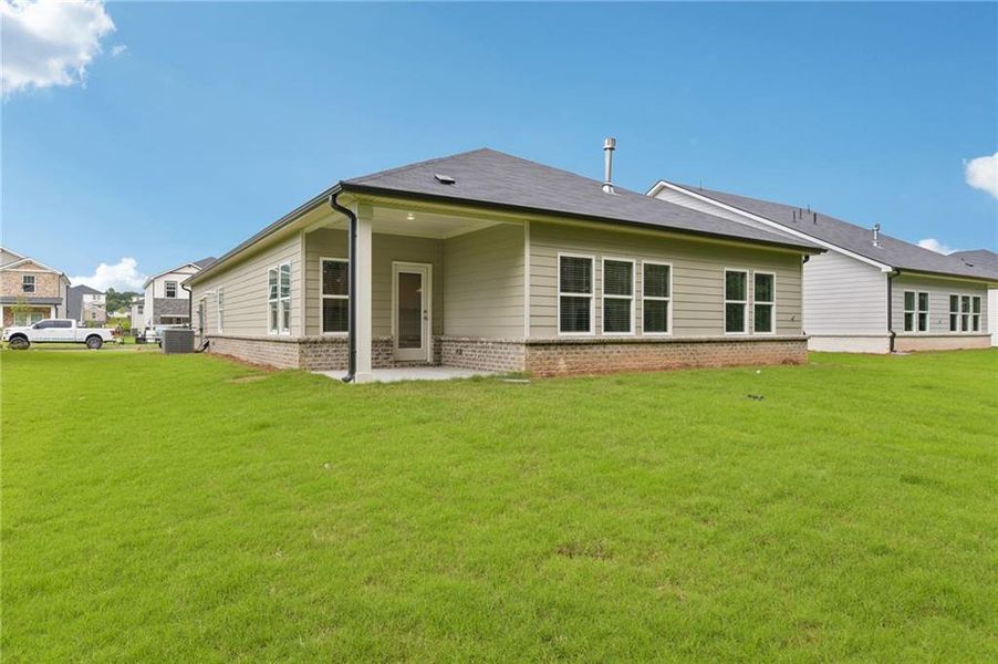 Exterior details and patio area of a home in Parkside at Grayson, Grayson (Image 3).