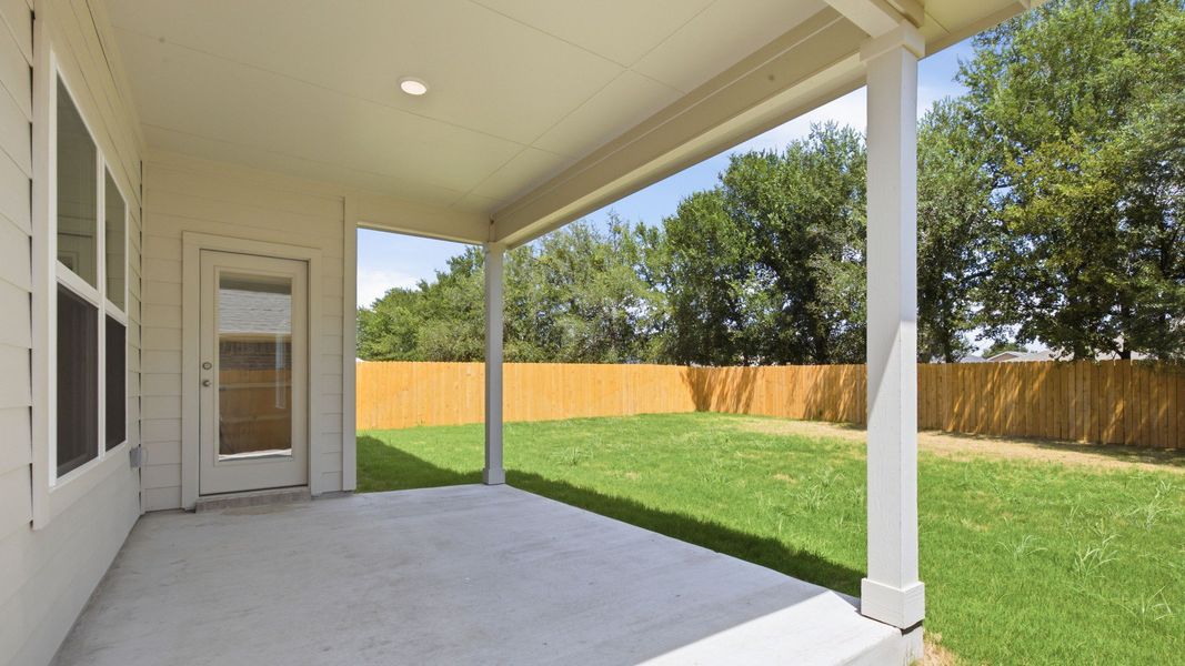 Exterior details and patio area of a home in Creeks Crossing, Elgin (Image 2). Exterior details and patio area of a home in Creeks Crossing, Elgin (Image 2).
