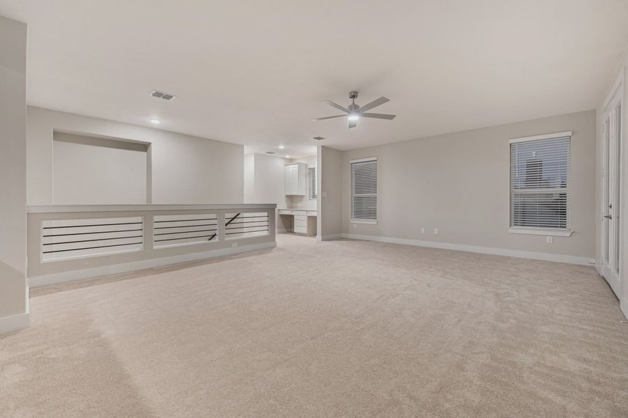 Representative unfurnished interior of a home built from the Rockwell by Chesmar Homes in Heimer Estates at Garden Ridge, Fulshear (Image 17).
