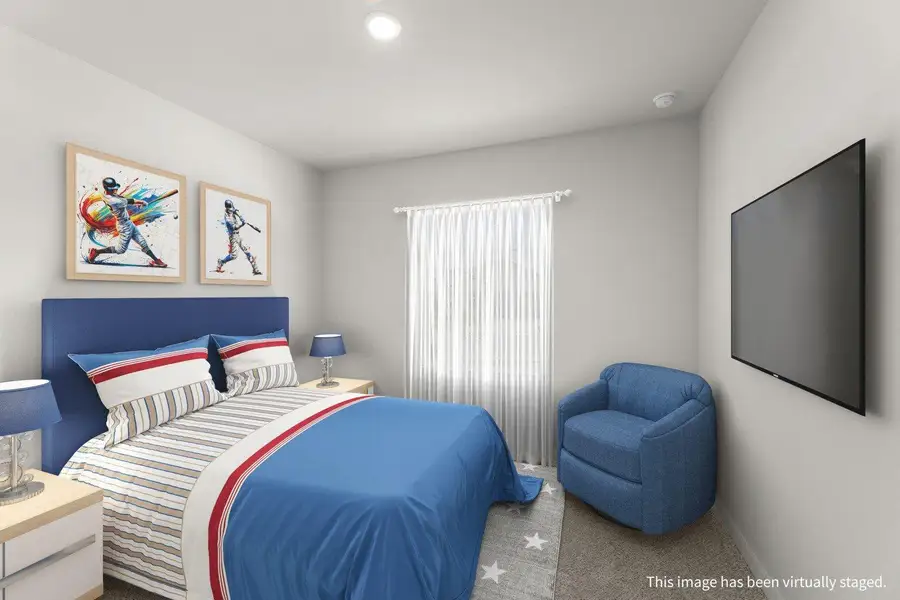 A cheerful, sun-filled bedroom offers a welcoming and comfortable retreat. A cheerful, sun-filled bedroom offers a welcoming and comfortable retreat.