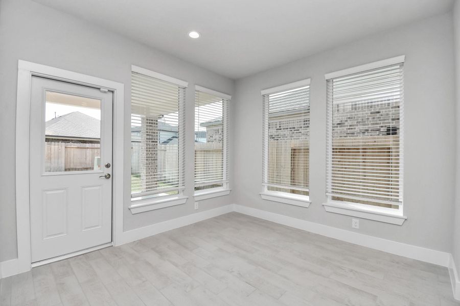 Create lasting memories with your family and friends at the dining table! This expansive dining room showcases sophisticated flooring, custom paint, and seamlessly connects to the family room and kitchen, providing an open and inviting atmosphere. Create lasting memories with your family and friends at the dining table! This expansive dining room showcases sophisticated flooring, custom paint, and seamlessly connects to the family room and kitchen, providing an open and inviting atmosphere.