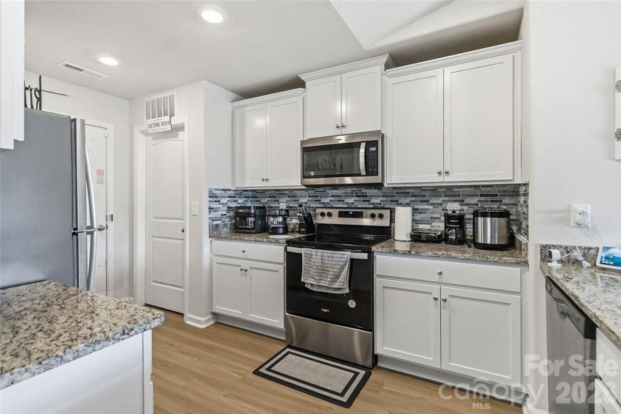 Furnished interior view inside a new home in McKee Creek Village, Charlotte (Image 11).