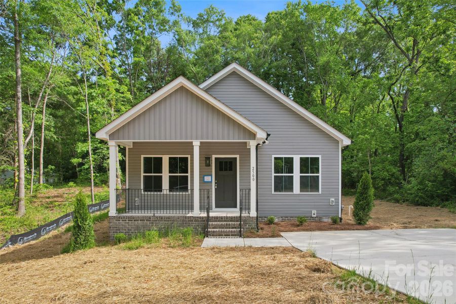 Front exterior of a new home in , Gastonia, NC, highlighting curb appeal (Image 12).